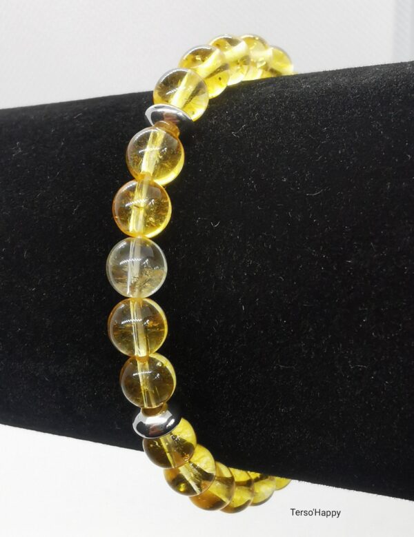 Bracelet en pierres naturelles de citrine et d cristal de roche. Perles intercalaires en acier inoxydable